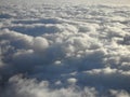 On top of white fluffy curvy clouds