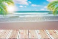 Top of wood table with blurred sea and coconut tree background Royalty Free Stock Photo