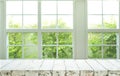 Top of wood table counter on blur window view garden background Royalty Free Stock Photo