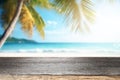 Top of wood table with seascape, blur calm sea and sky at tropical beach background. Empty table ready for your product Royalty Free Stock Photo