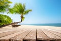 Top of wood table with seascape and palm tree