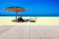 Top wooden table and blur of tropical beach background Royalty Free Stock Photo