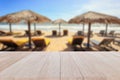 Top wooden table and blur of tropical beach background