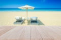 Top wooden table and blur of tropical beach background Royalty Free Stock Photo