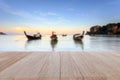 Top wooden table and blur of tropical beach background Royalty Free Stock Photo