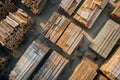 topdown view of organized wood stacks at an outdoor lumberyard