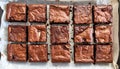 Topdown view of sliced chocolate brownies on baking tray with gooey centers.. Generative AI