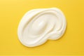 Topdown View Of White Cream Smear On Yellow Background