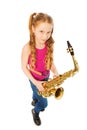 Tope view of smiling girl holding alto saxophone