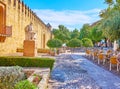 The topiary park and outdoor cafe at the Averroes statue, Cordoba, Spain Royalty Free Stock Photo