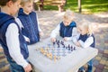 The topic children learning, logical development, mind and math, miscalculation moves advance. large family brothers and sister Royalty Free Stock Photo
