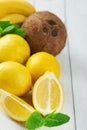 Topical fruits on a white wooden table