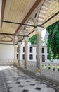 Topkapi Palace, one of the inner passages with columns, arches and marble floor on a sunny day. Ottoman architecture, Istanbul,