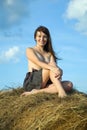 Topless girl hay bale