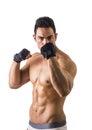 Topless Muscled Man Wearing Gloves for Workout