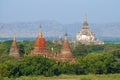 The tops of ancient Buddhist temples on a sunny afternoon. Bagan, Myanmar Royalty Free Stock Photo
