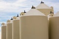 Tops of grain bins in a diagonal alignment