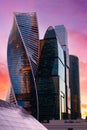 Tops of modern corporate buildings against the gloomy red sunset sky. high-rise buildings and skyscrapers Moscow International Bus