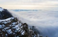 Tops of mountains over fog.