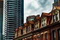 The Tops of Old Brick Buildings Surrounded by Skyscrapers in Downtown Toronto Royalty Free Stock Photo