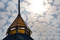 The tops of the tabernacles with soft sunlight and cloud cover