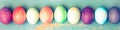 Topview, colorful dyed easter eggs on blue vintage wooden table Royalty Free Stock Photo