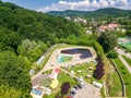 Topview from a drone over the pool surrounded by green trees Royalty Free Stock Photo