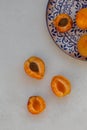 Topview image of apricots on light gray tabletop Royalty Free Stock Photo