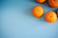 Topview of orange with desktop on plates blue background. topview or flat lay fruit.