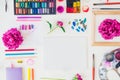 Topview workplace of creative artist mockup. Blank canvas with drawing materials and peony flowers on white background. Workshop, Royalty Free Stock Photo