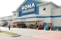 tor, canada - august 11, 2023: rona home and garden store front entrance with sign logo and customer person. p10 13
