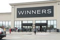 tor, canada - august 17, 2023: winners store front entrance clothing fashion apparel outlet with customers 232 p 17 h