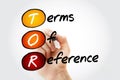 TOR Terms Of Reference - define the purpose and structures of a project, committee, meeting, negotiation, acronym text with marker