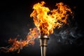 Torch with Flames on Black Background Royalty Free Stock Photo