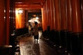 Tori gates in Fushimi Inari Shrine at night with selective focus , Kyoto, Japan