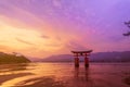 Torii Gate of Itsukushima Shrine on sunset time at Miyajima, Japan Royalty Free Stock Photo