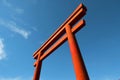 Torii gate red blue sky bottom view japanese culture photography Royalty Free Stock Photo