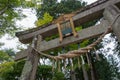 Torii at Takkoku-no-Iwaya Bisyamondo Hall in Hiraizumi, Iwate, Japan. The temple was founded by