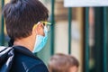 Back to school. Kid or child going to school wearing protective mask