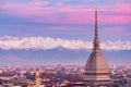 Torino Turin, Italy: cityscape at sunrise with details of the Mole Antonelliana towering over the city. Scenic colorful light on Royalty Free Stock Photo