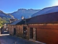 Street of Torla-Ordesa and Mondarruego mountain at the background. Royalty Free Stock Photo