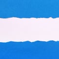 Torn blue paper strip edge border frame center square