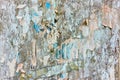 Torn bulletin board with scraps of posters Royalty Free Stock Photo