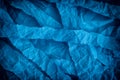 Torn and crumpled blue background Royalty Free Stock Photo