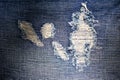 Torn Denim blue jeans, Close up & Macro shot, Abstract textile texture background Royalty Free Stock Photo