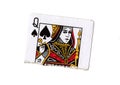 A torn half of a queen of spades playing card.