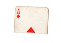 A torn half of a vintage ace of diamonds playing card. Royalty Free Stock Photo