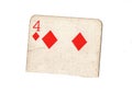 A torn half of a vintage four of diamonds playing card. Royalty Free Stock Photo