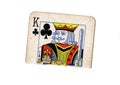 A torn half of a vintage king of clubs playing card. Royalty Free Stock Photo