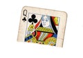 A torn half of a vintage queen of clubs playing card. Royalty Free Stock Photo